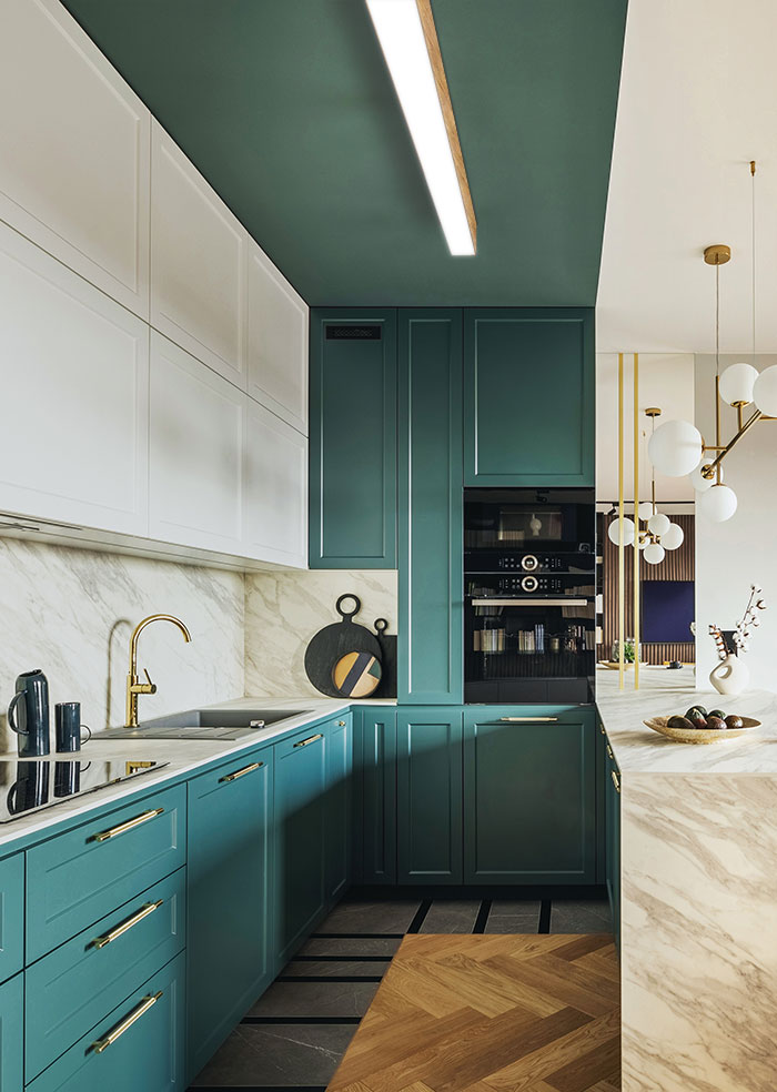 modern kitchen with green cabinets, wood and marble accents