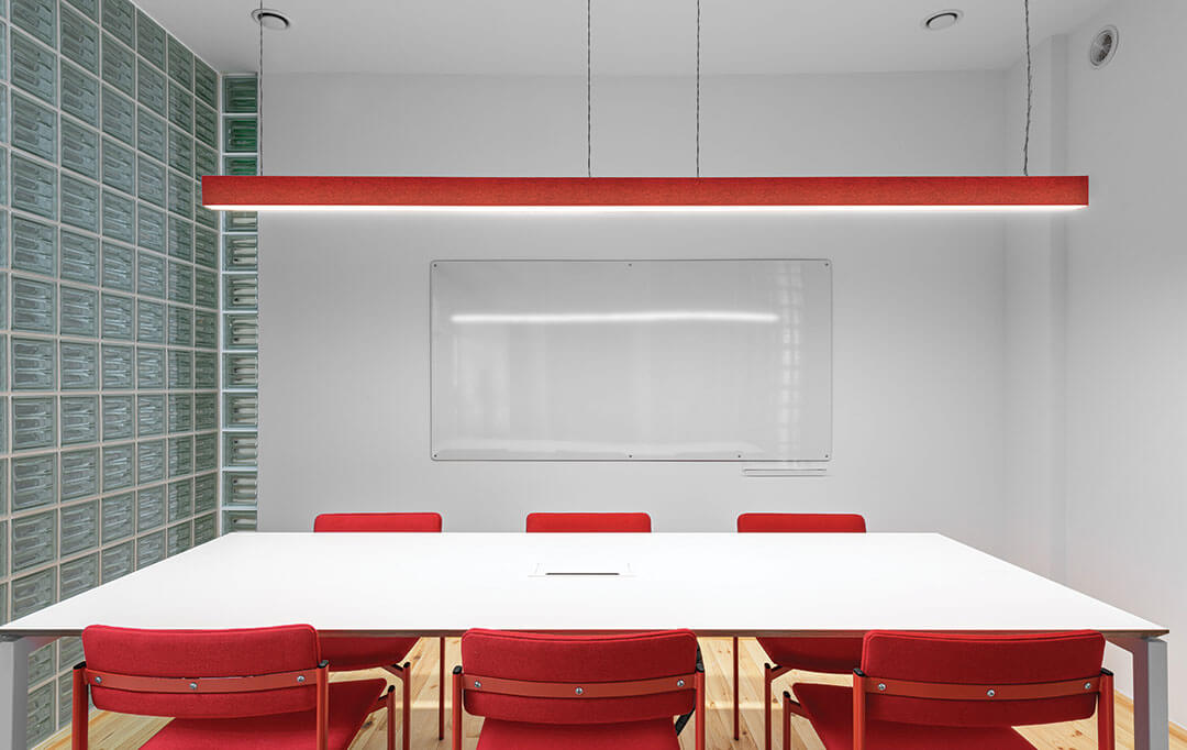 office with linear pendant fixture with red felt  